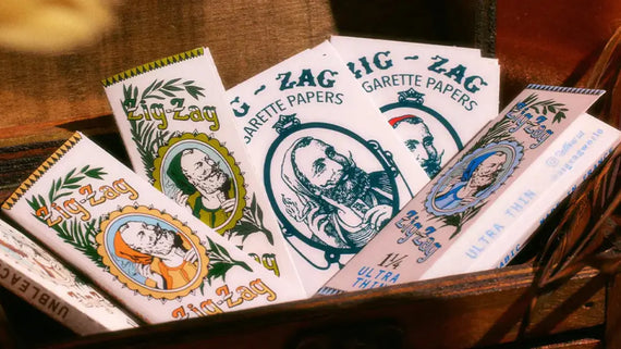 Rolling essentials for smokers featuring a colorful variety of Zig-Zag rolling papers in classic packaging.