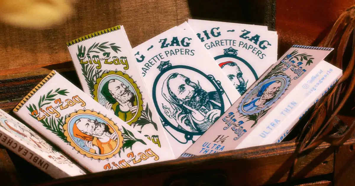 Rolling essentials for smokers featuring a colorful variety of Zig-Zag rolling papers in classic packaging.