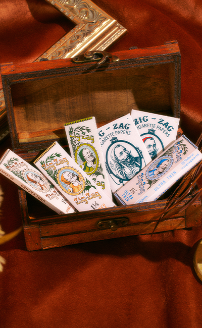 Zig-Zag rolling paper cover showing classic branded rolling paper packs in assorted styles