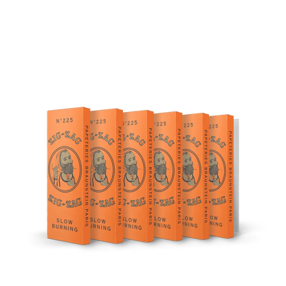 French orange rolling papers 6 pack featuring Zig-Zag branding and slow burning design for a classic smoking experience.