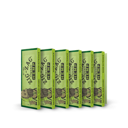 King sized rolling papers in Zig-Zag Organic Hemp green packs made in France with natural gum Arabic, displayed in a row.