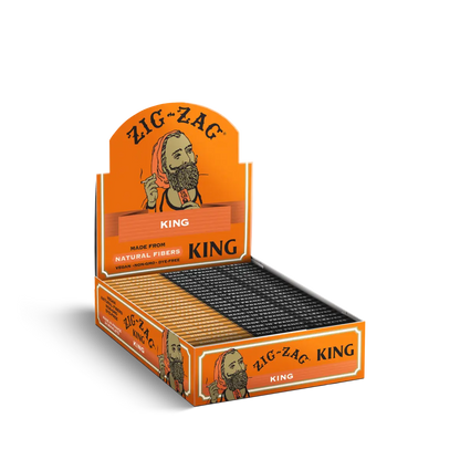 King size rolling paper carton of Zig-Zag made from natural fibers, featuring orange display box with black and gold packs.